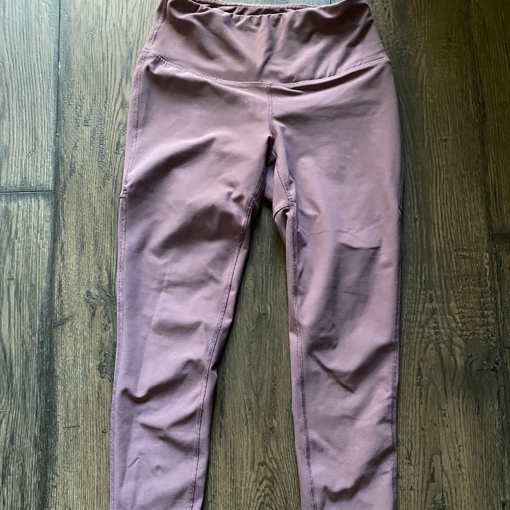 Cute purple leggings. Barely worn.